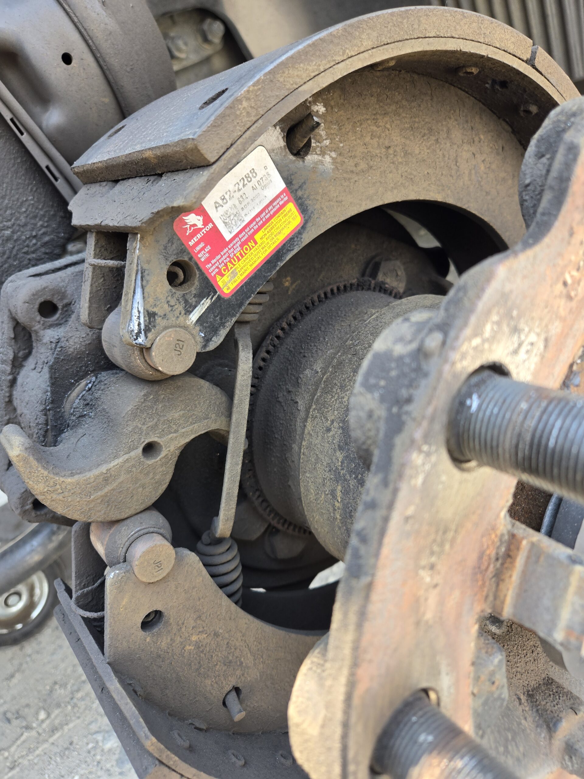 Close-up view of a brake component at Big Wheels Repair in Gainesville, highlighting our expertise in heavy duty truck repair and semi-truck maintenance.