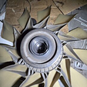 Close-up of a cooling fan assembly from a heavy duty truck at Big Wheels Repair in Gainesville, illustrating repair services.