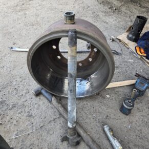 Close-up of a brake drum and axle shaft at Big Wheels Repair in Gainesville, illustrating heavy duty truck repair services.