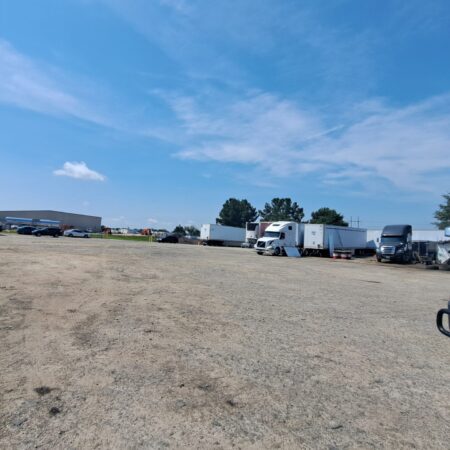 Trucks parked at Big Wheels Repair in Gainesville, showcasing the heavy duty truck repair shop and semi-truck maintenance services.