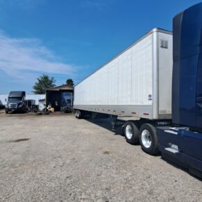 Heavy duty truck and trailer at Big Wheels Repair in Gainesville, highlighting the heavy duty truck repair shop and commercial trailer repair services.