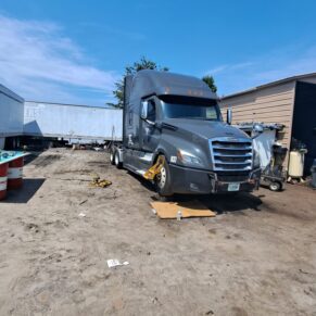 Heavy duty truck undergoing maintenance at Big Wheels Repair in Gainesville, showcasing semi-truck maintenance and repair services.