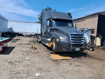 Heavy duty truck undergoing maintenance at Big Wheels Repair in Gainesville, showcasing semi-truck maintenance and repair services.