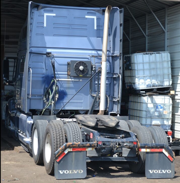 A semi-truck undergoing maintenance at Big Wheels Repair in Gainesville, highlighting heavy duty truck repair and commercial trailer repair services.